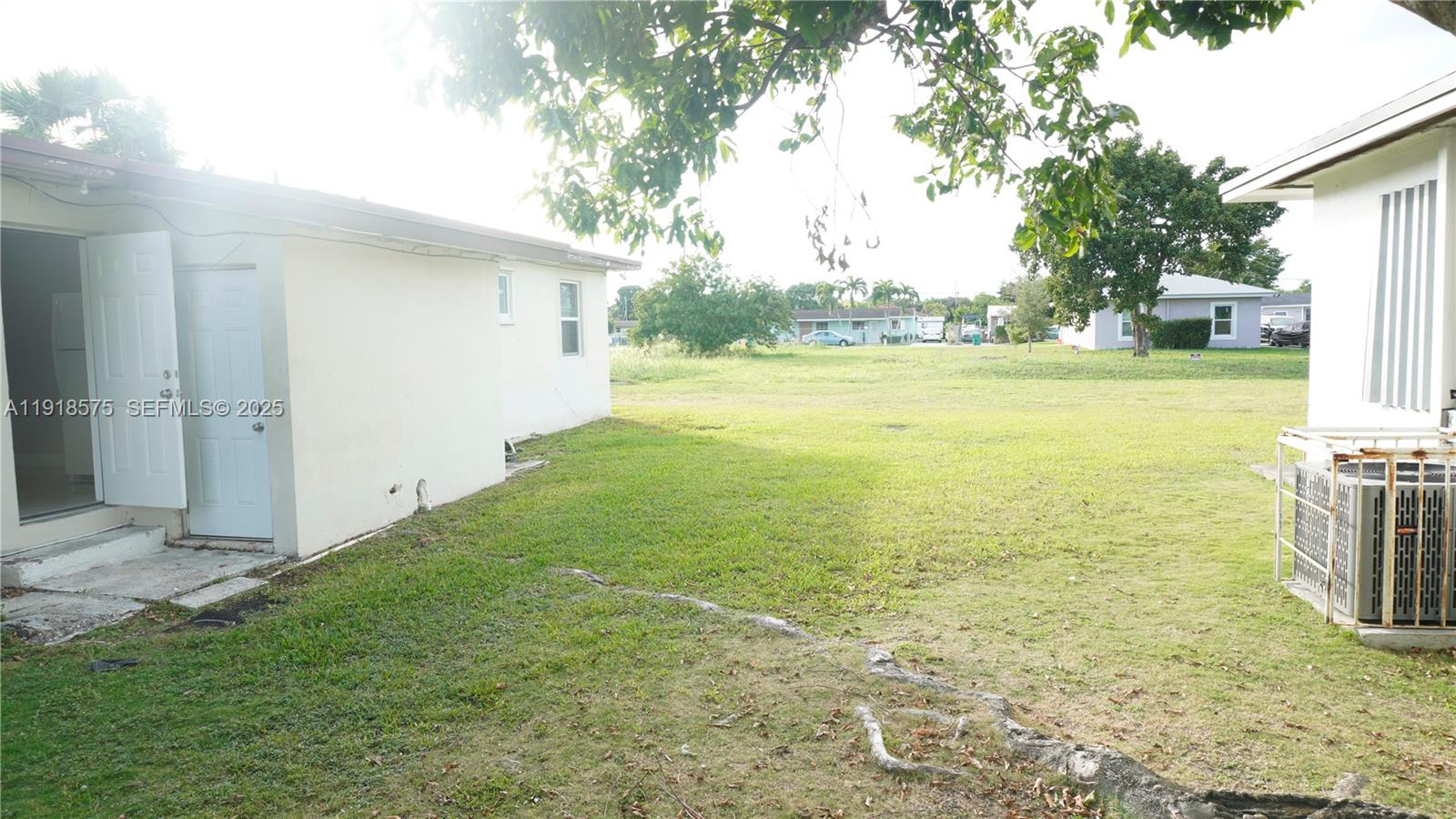 13701 Southwest 266th Street, Unit 13701 Homestead, FL 33032 - Photo 10 of 10 a view of a ocean view with a big yard