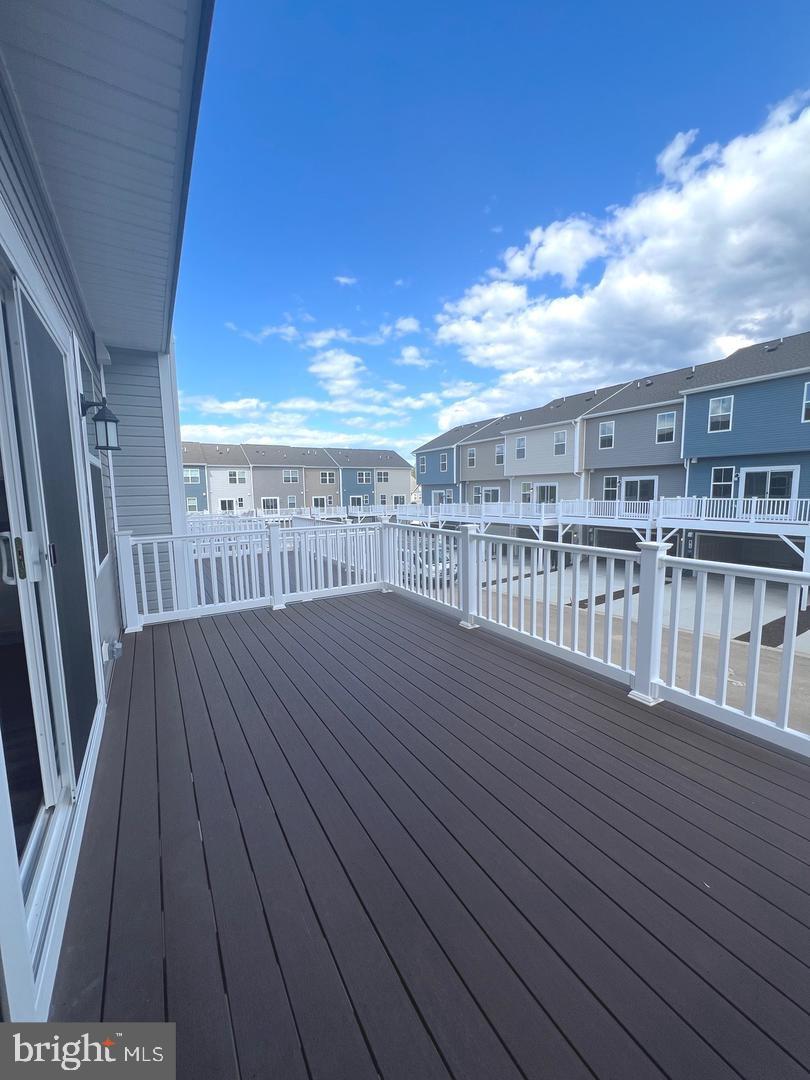 342 Watercourse Drive Ranson, WV 25438 - Photo 11 of 17 Spacious deck with scenic views.