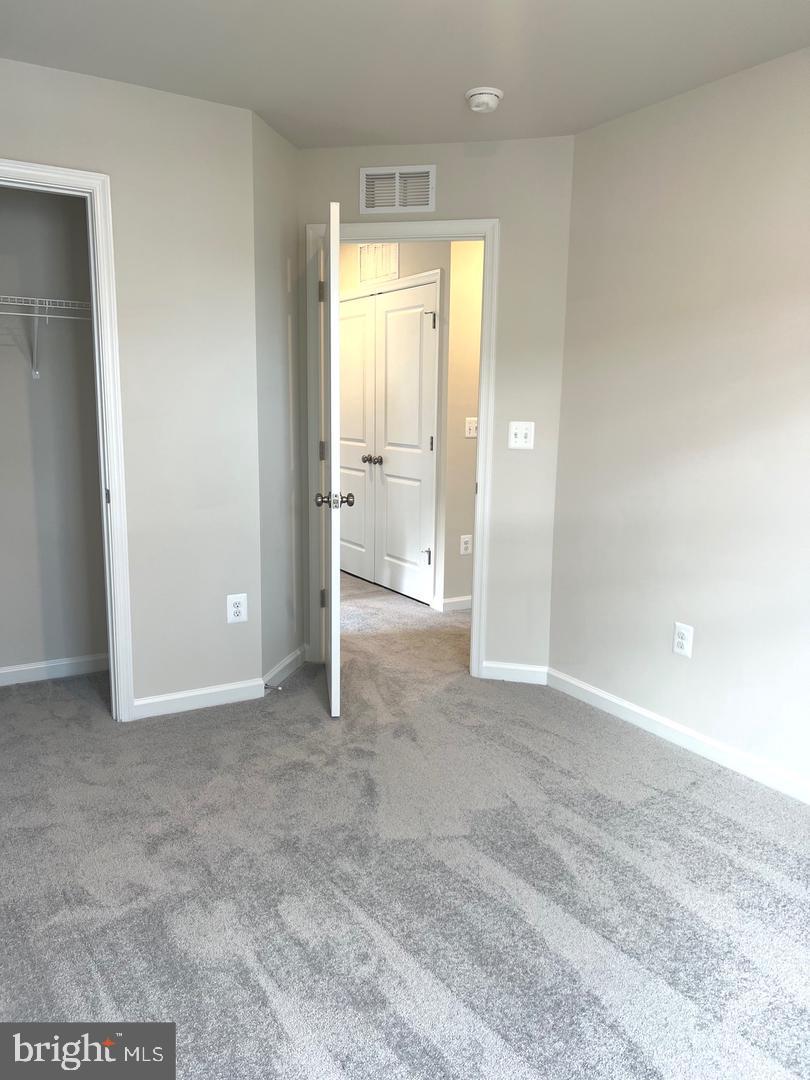 342 Watercourse Drive Ranson, WV 25438 - Photo 15 of 17 Bright and inviting bedroom space.