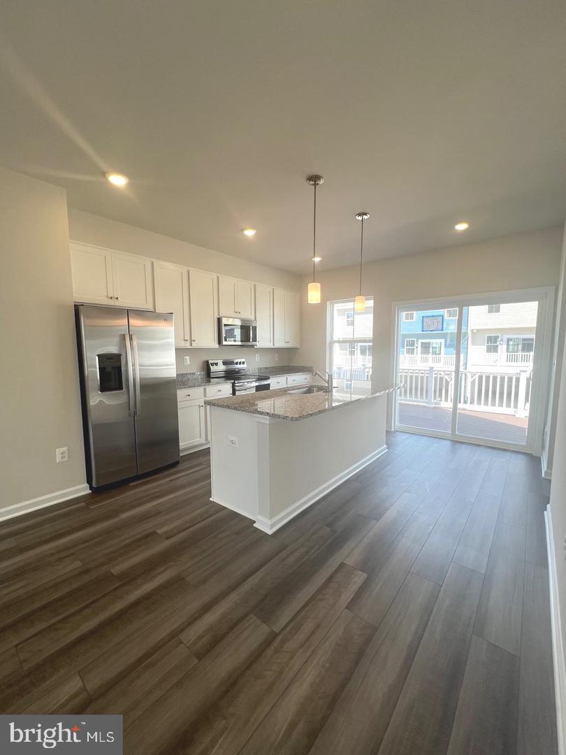 342 Watercourse Drive Ranson, WV 25438 - Photo 5 of 17 Modern kitchen with open layout charm.