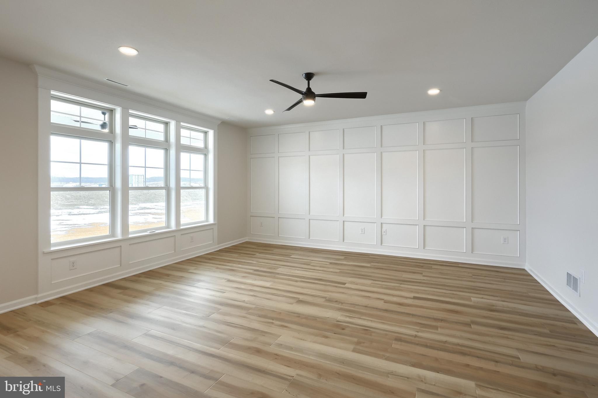 535 Lumber Street Littlestown, PA 17340 - Photo 37 of 40 a view of an empty room with a window and wooden floor