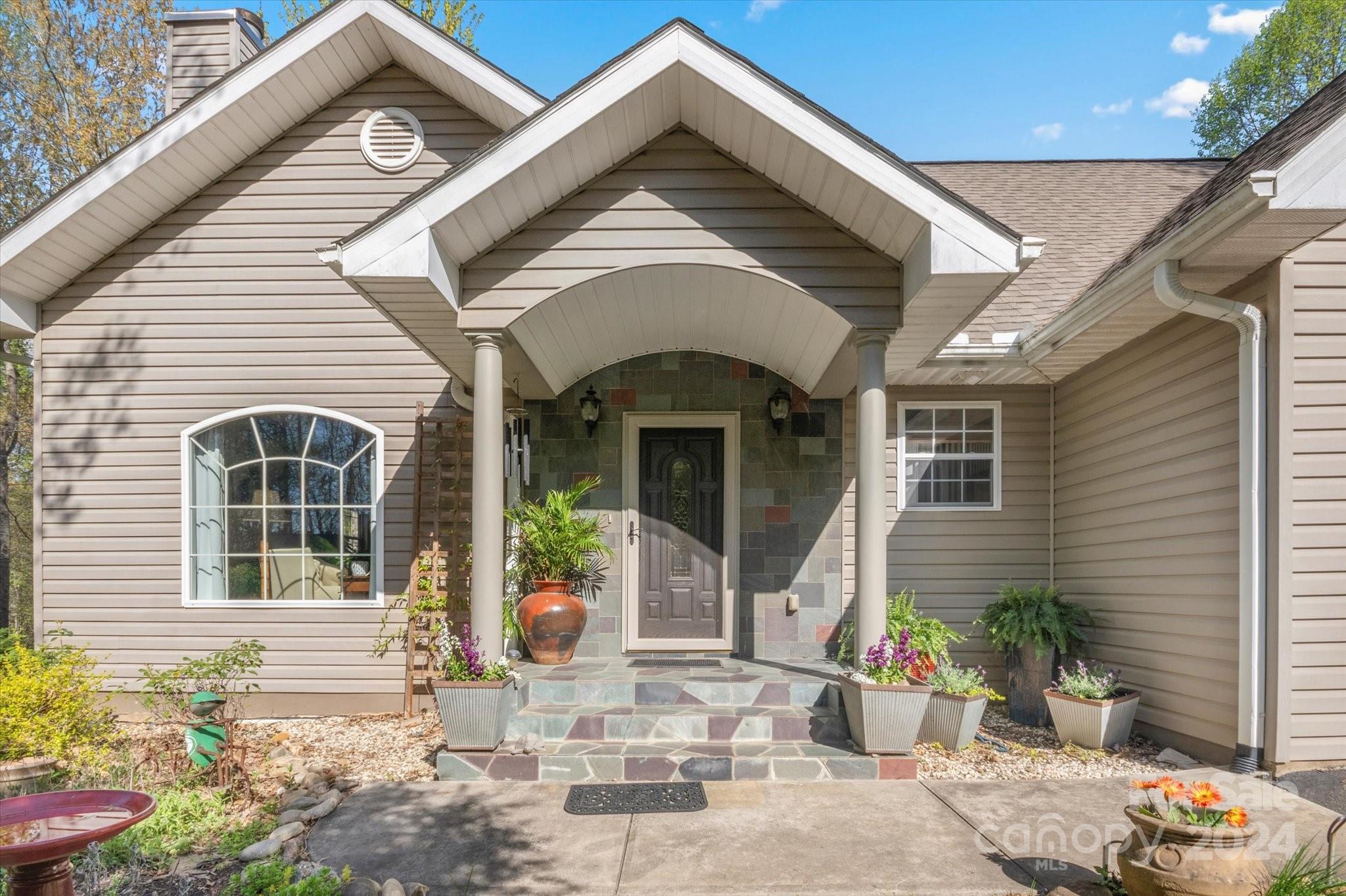 16 Leisure Loop Weaverville, NC 28787 - Photo 2 of 44 a view of a house with outdoor space
