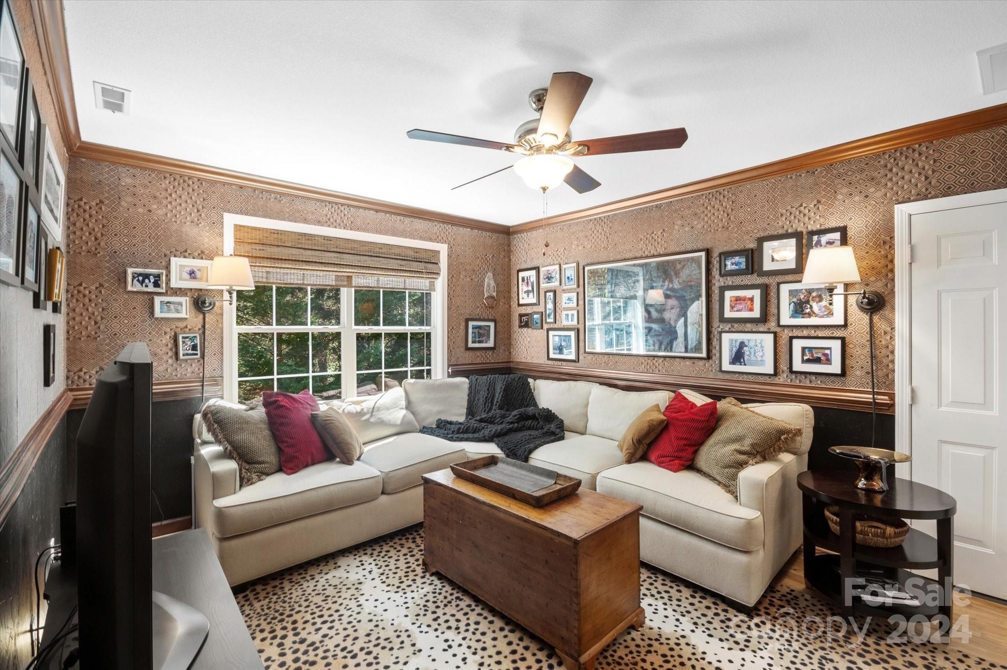 16 Leisure Loop Weaverville, NC 28787 - Photo 23 of 44 a living room with furniture and a large window