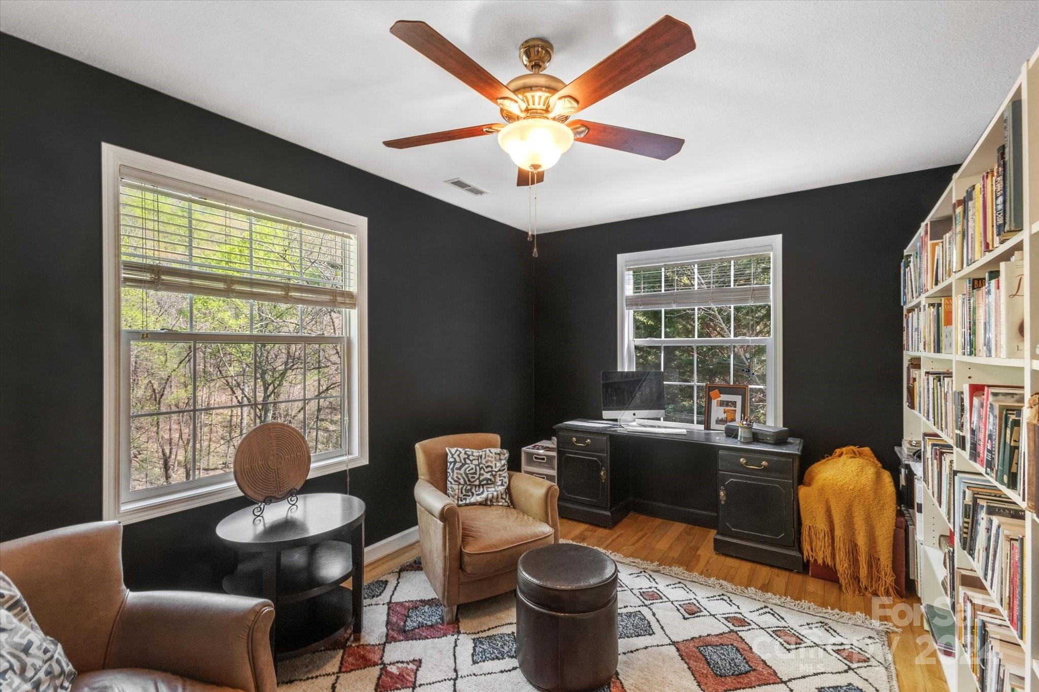 16 Leisure Loop Weaverville, NC 28787 - Photo 25 of 44 a living room with furniture and a large window