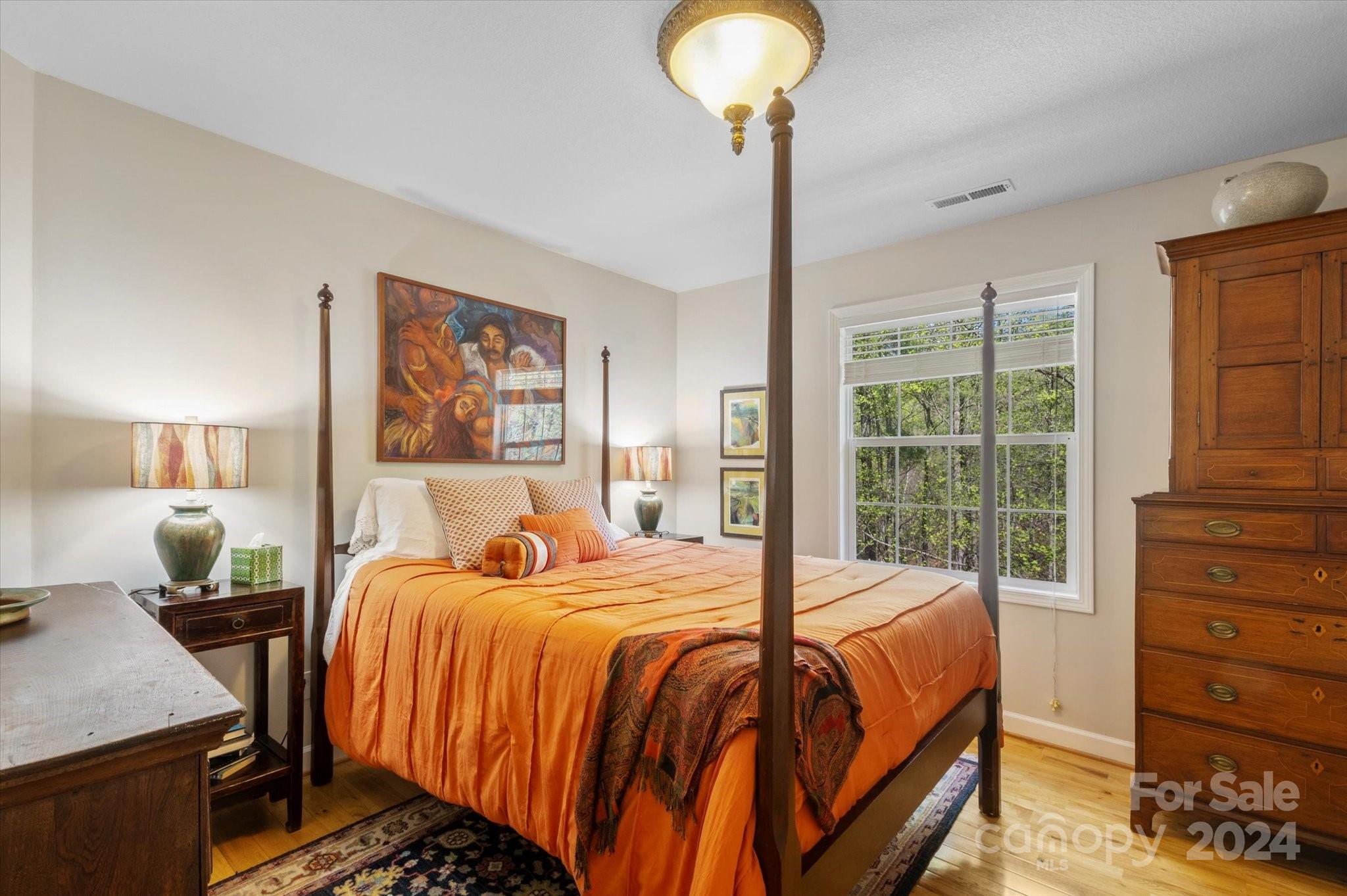 16 Leisure Loop Weaverville, NC 28787 - Photo 29 of 44 a bedroom with a bed and a window