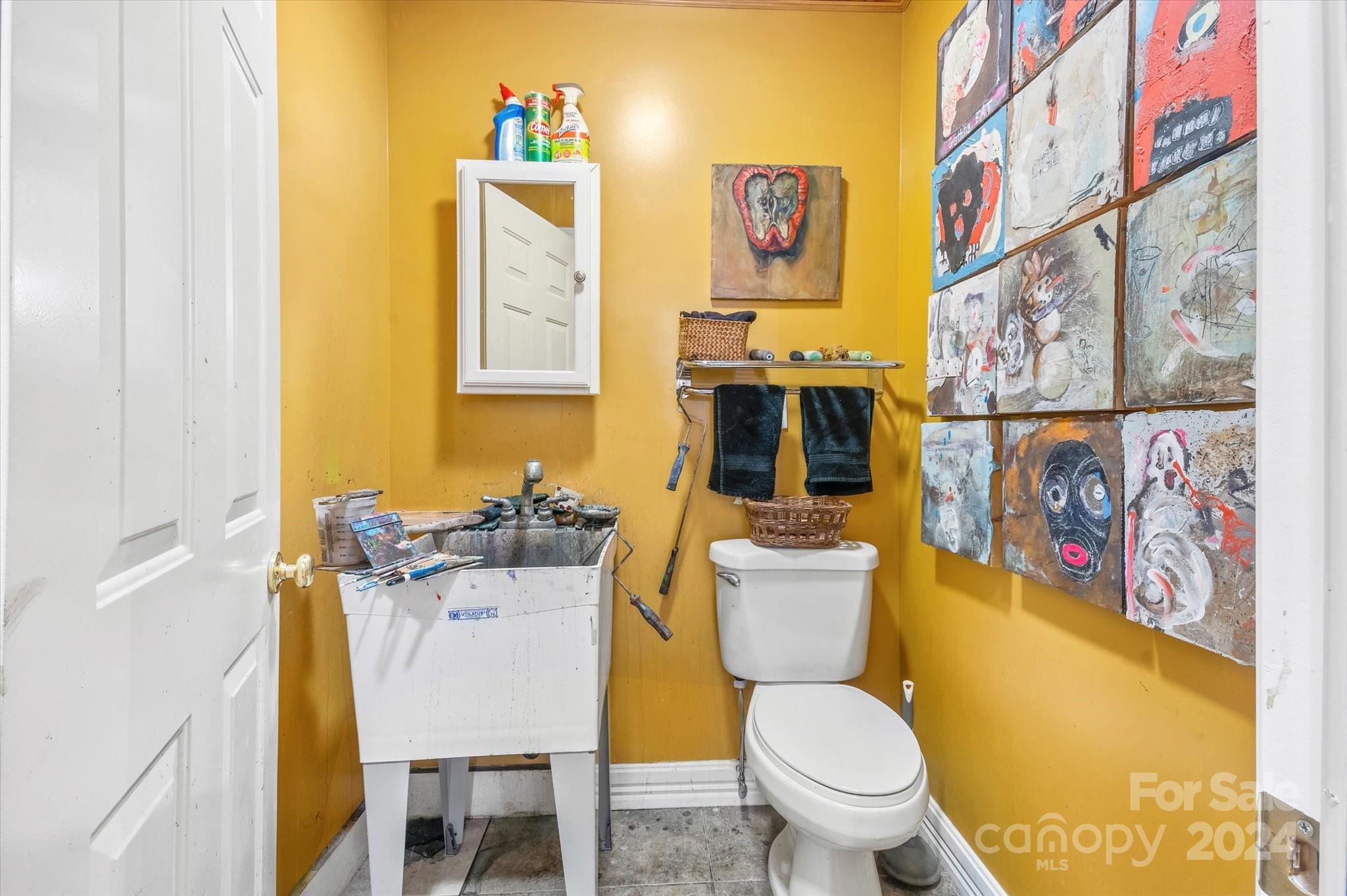 16 Leisure Loop Weaverville, NC 28787 - Photo 38 of 44 a bathroom with a toilet and a sink