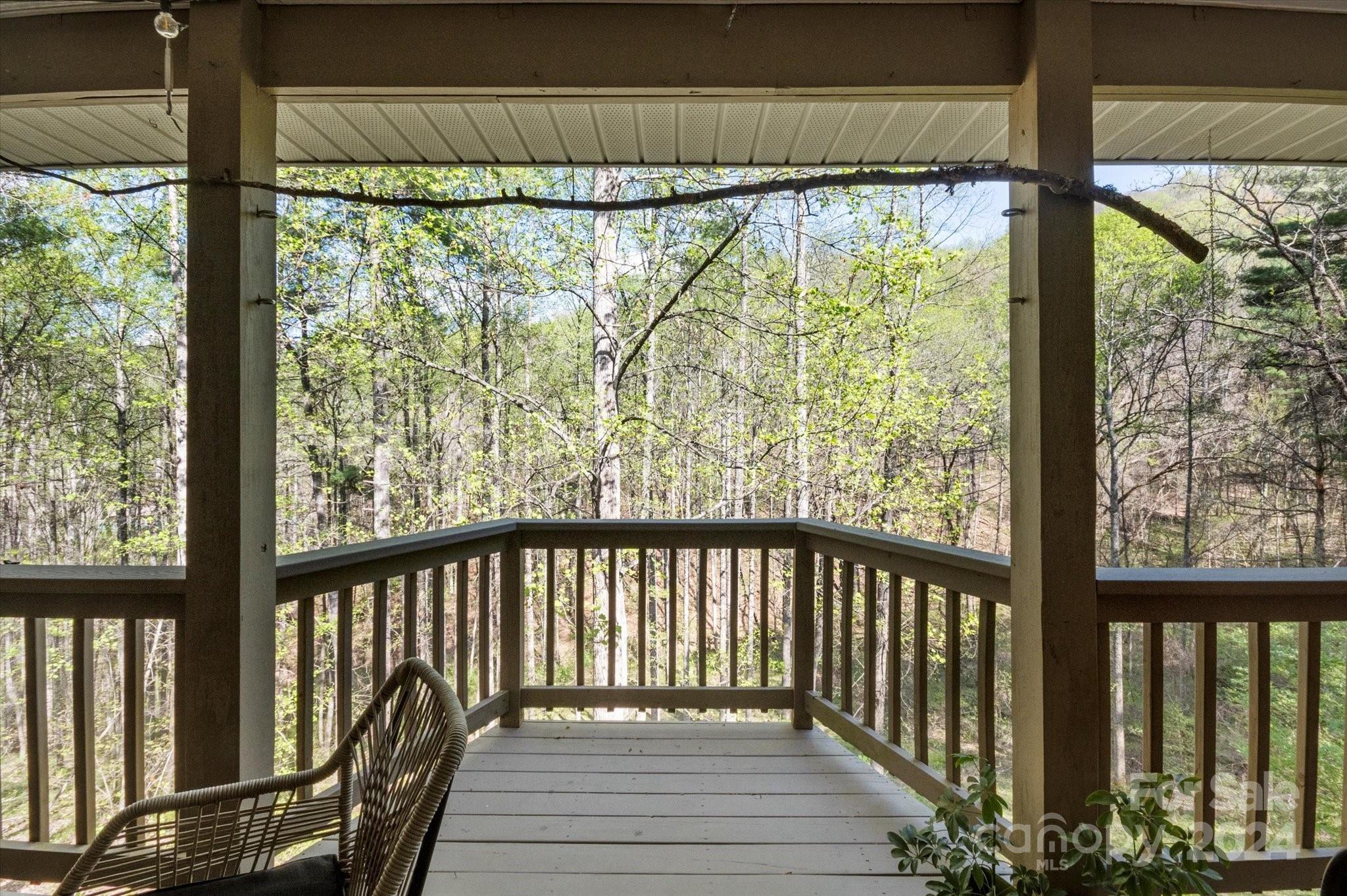 16 Leisure Loop Weaverville, NC 28787 - Photo 41 of 44 a view of a porch with wooden floor