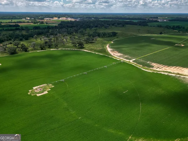 a view of a golf course with a lake