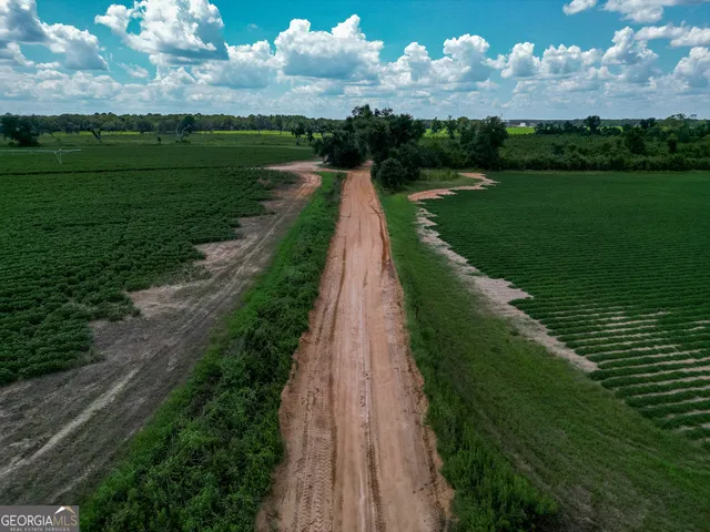 a view of a golf course with a lake