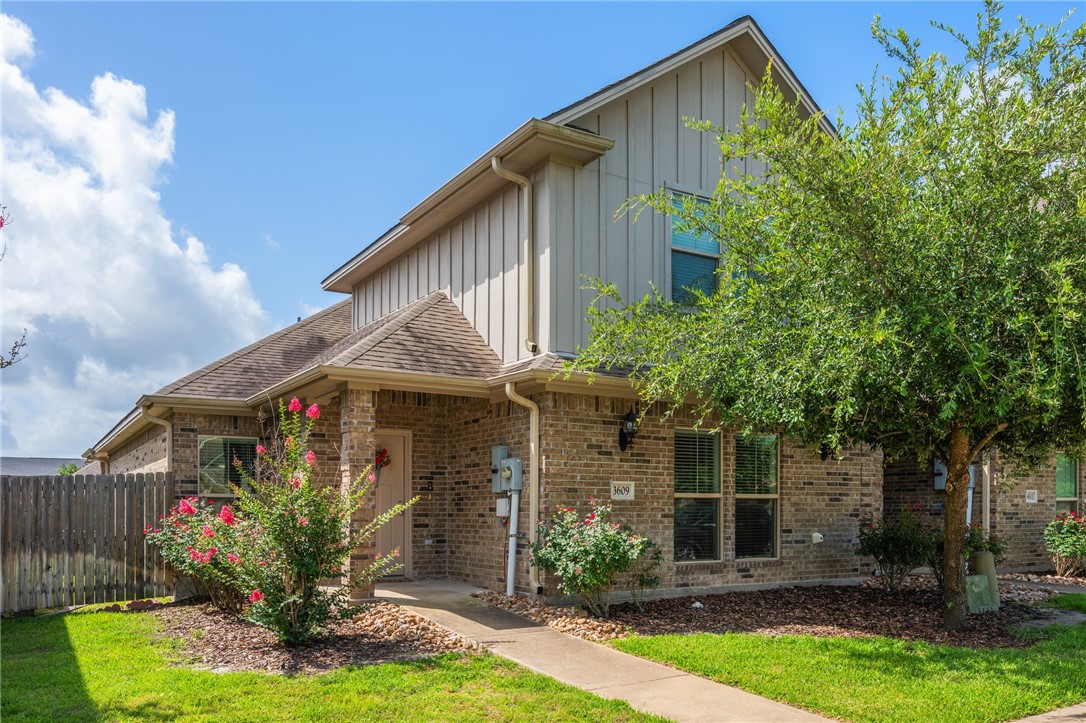 3609 Haverford Road College Station, TX 77845 - Photo 1 of 1 View of front facade featuring board and batten siding and brick siding