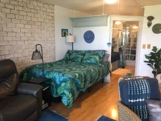 a view of balcony and wooden floor