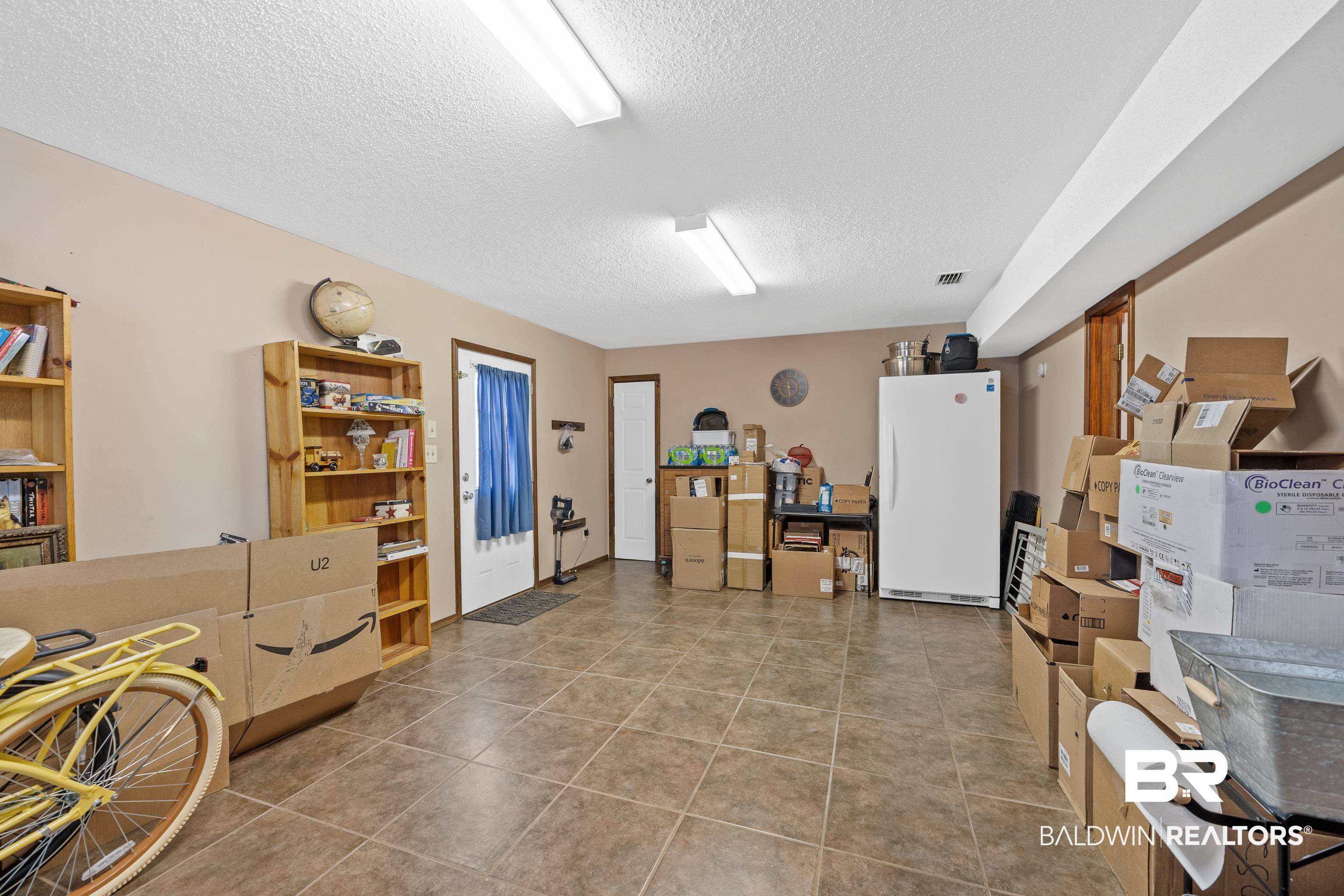 460 Ridgewood Drive Daphne, AL 36526 - Photo 14 of 31 Miscellaneous room featuring a textured ceiling
