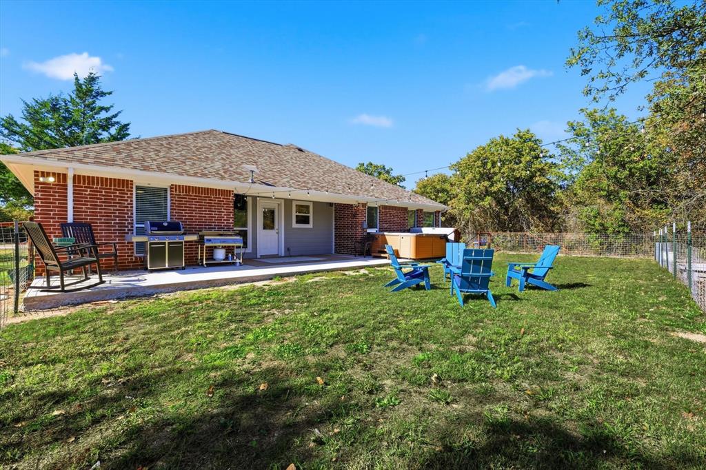 138 Gobbler Road Nocona, TX 76255 - Photo 26 of 35 a view of a house with a backyard porch and sitting area
