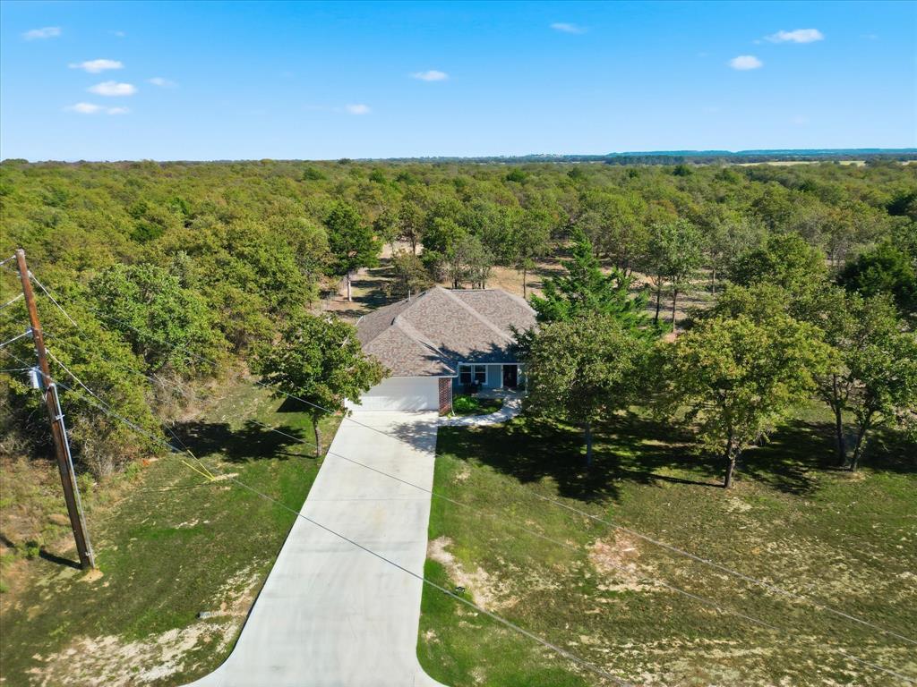 138 Gobbler Road Nocona, TX 76255 - Photo 29 of 35 a view of a lake with a yard