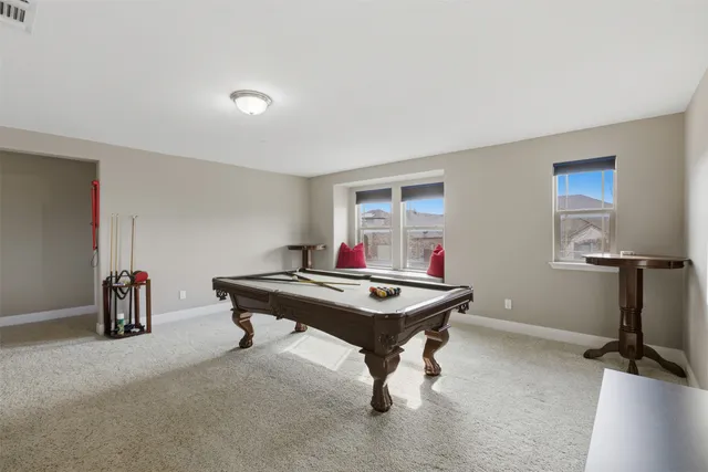 a view of a workspace with furniture