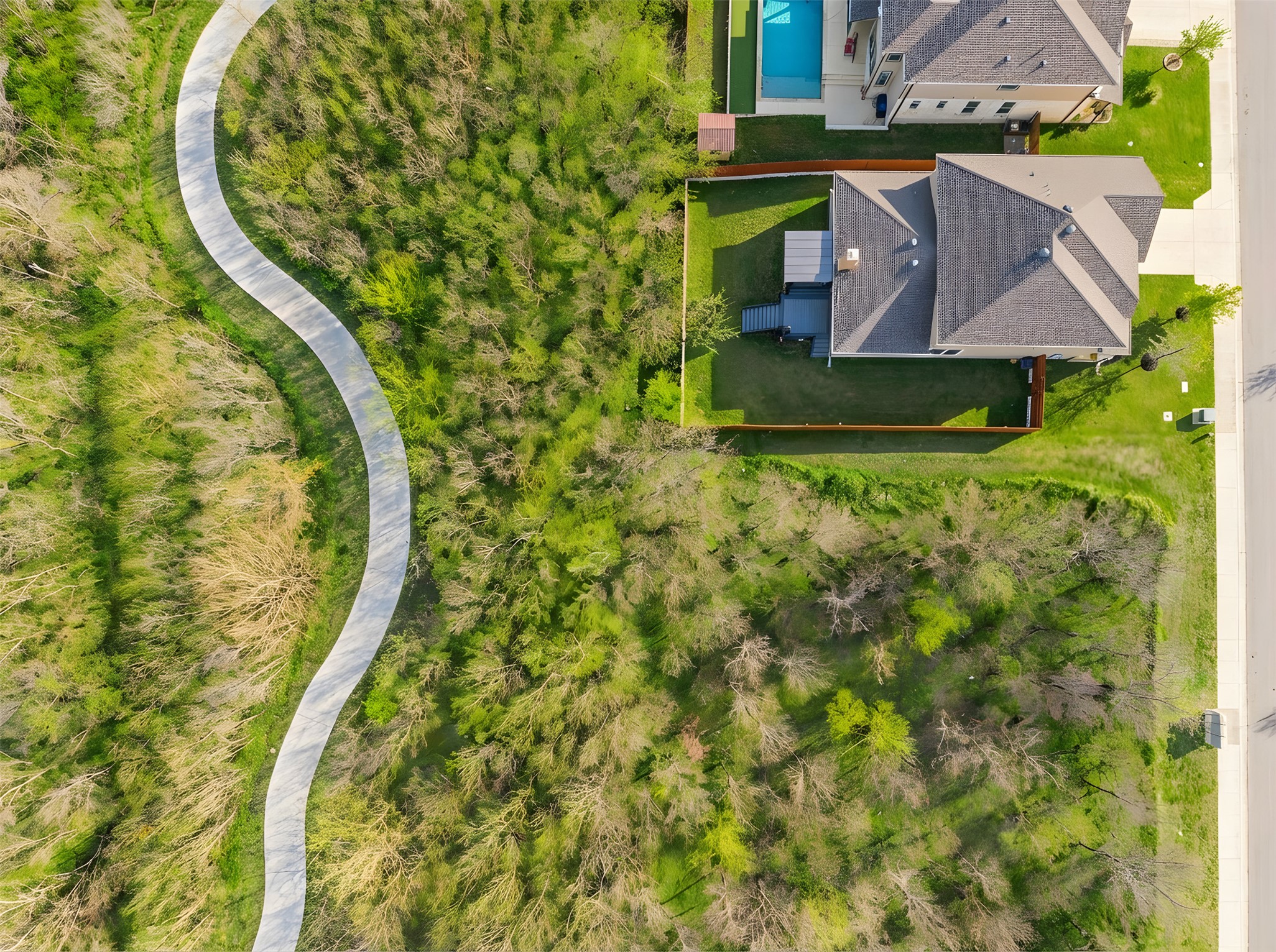 1011 Toltec Trail Georgetown, TX 78626 - Photo 35 of 40 Virtual color grading applied to landscape elements to achieve a seasonal effect of a lush, vibrant finish.