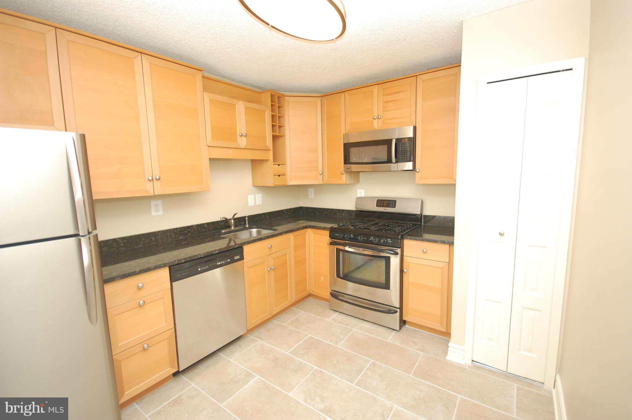 5225 Pooks Hill Road, Unit 809N Bethesda, MD 20814 - Photo 6 of 22 Kitchen - new cabinets, ss appliances and flooring