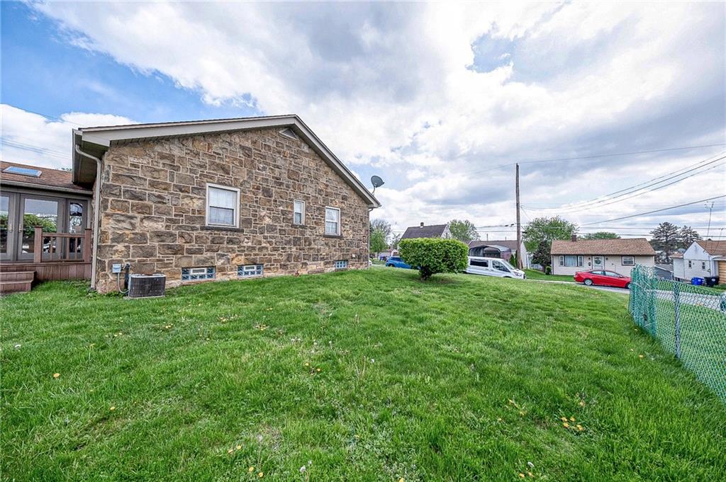 699 Kaye Avenue Monaca, PA 15061 - Photo 33 of 43 a view of a house with a backyard