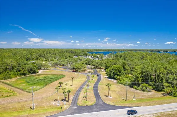 a view of a swimming pool with an outdoor space and seating area