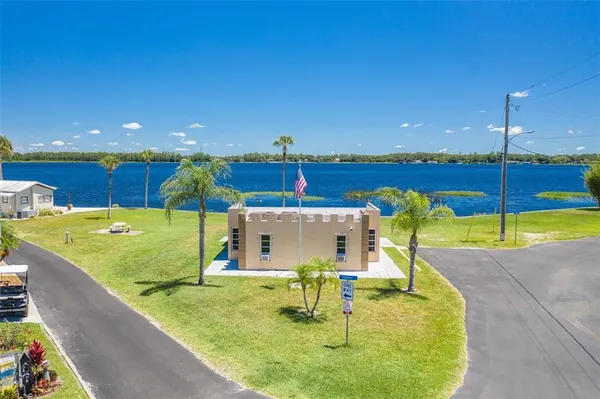 a view of a swimming pool with a patio