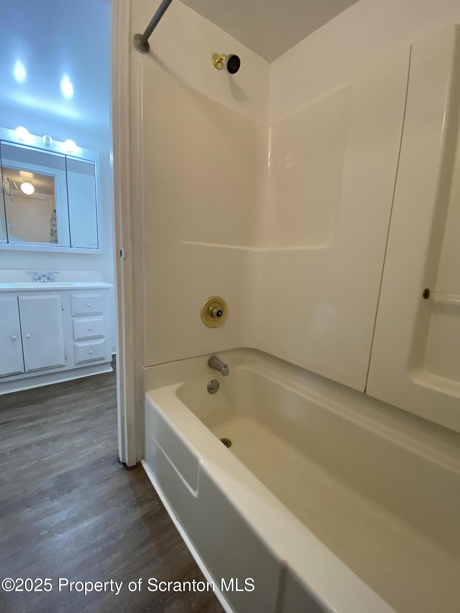 1309 Summit Pointe Scranton, PA 18508 - Photo 16 of 33 a spacious bathroom with a bathtub and shower