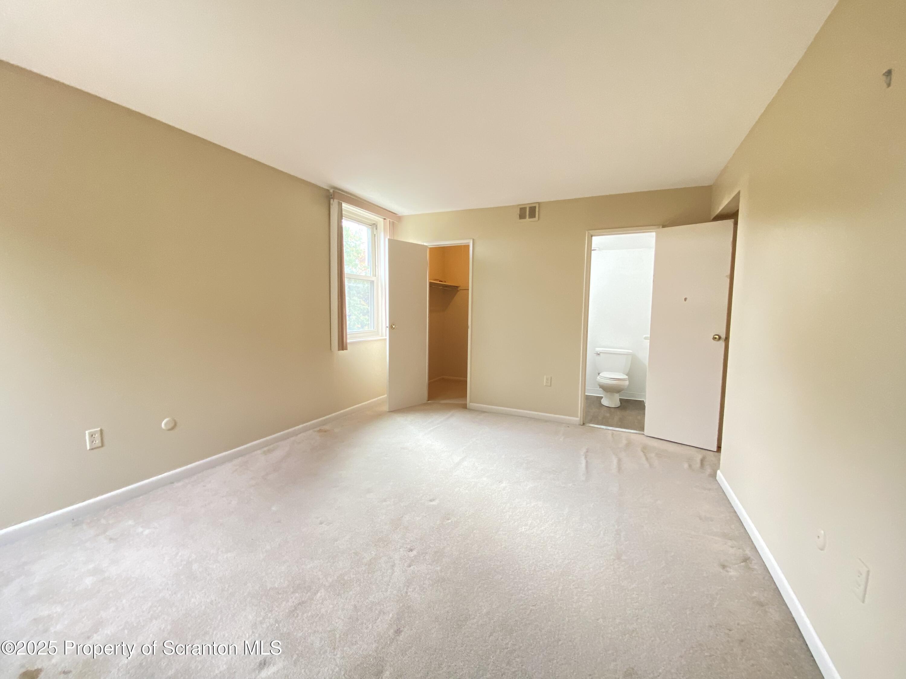 1309 Summit Pointe Scranton, PA 18508 - Photo 22 of 33 an empty room with a natural light
