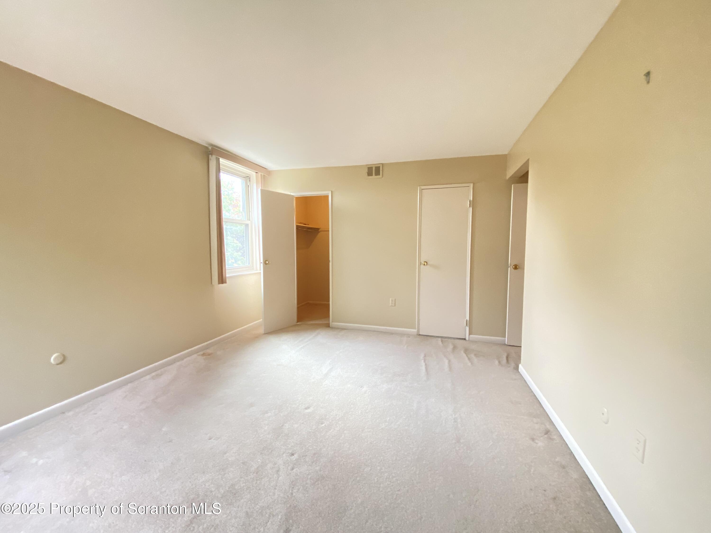 1309 Summit Pointe Scranton, PA 18508 - Photo 23 of 33 a view of an empty room with a window