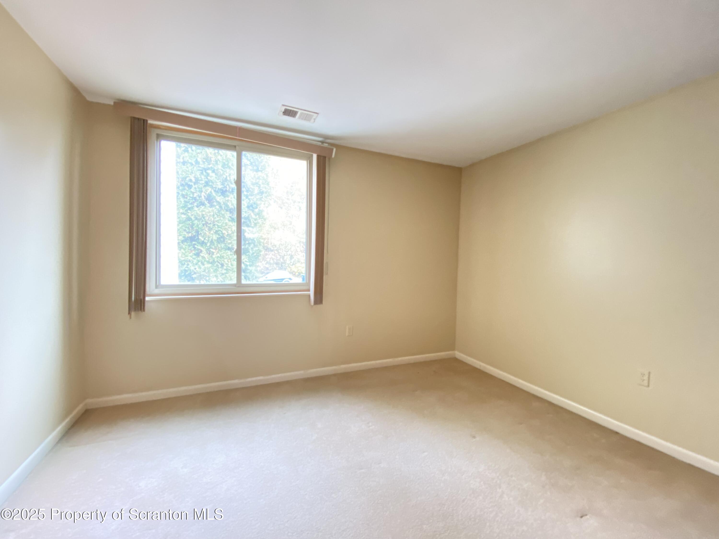 1309 Summit Pointe Scranton, PA 18508 - Photo 25 of 33 an empty room with a window