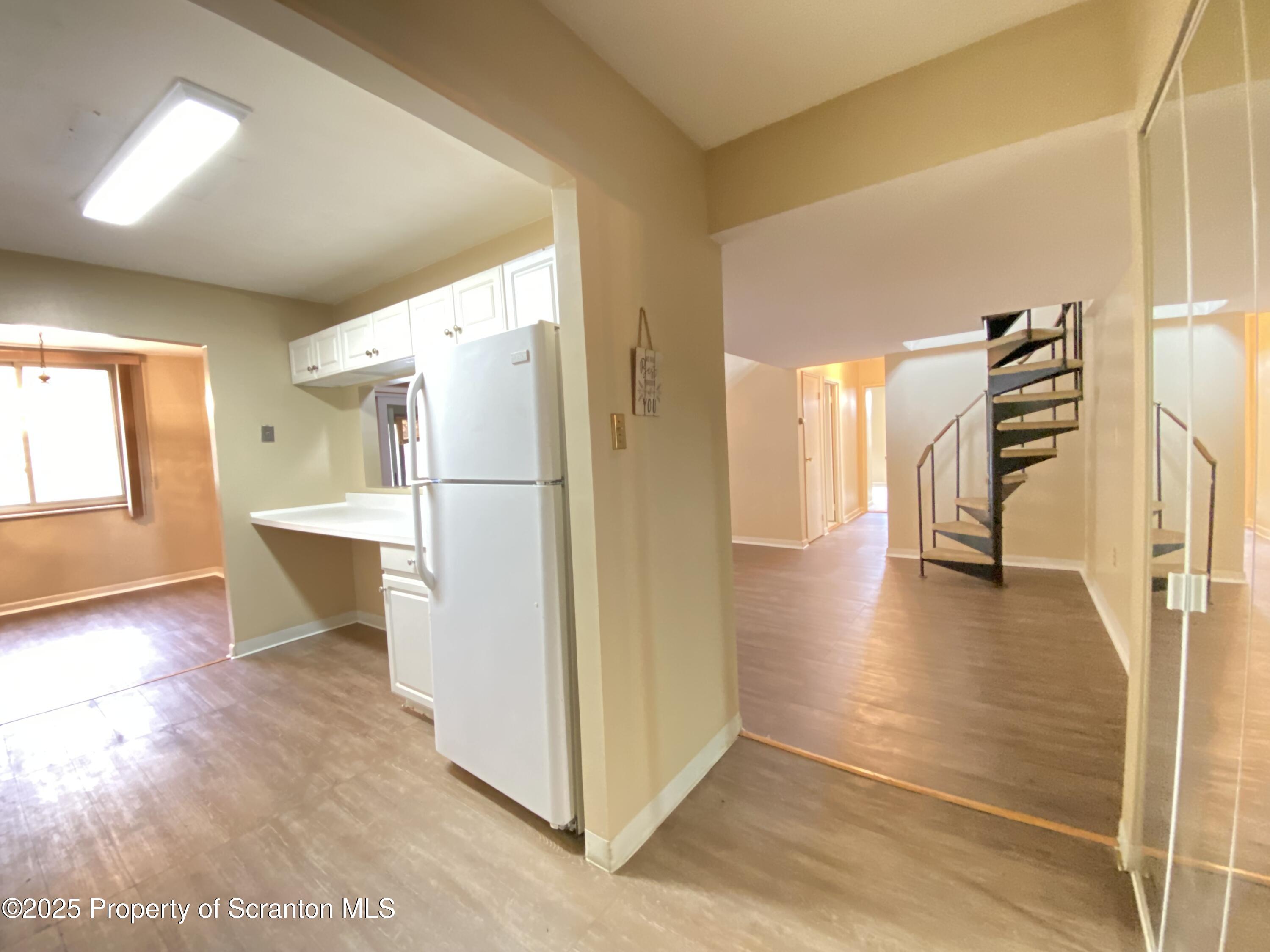 1309 Summit Pointe Scranton, PA 18508 - Photo 5 of 33 a view of a kitchen with refrigerator and an oven