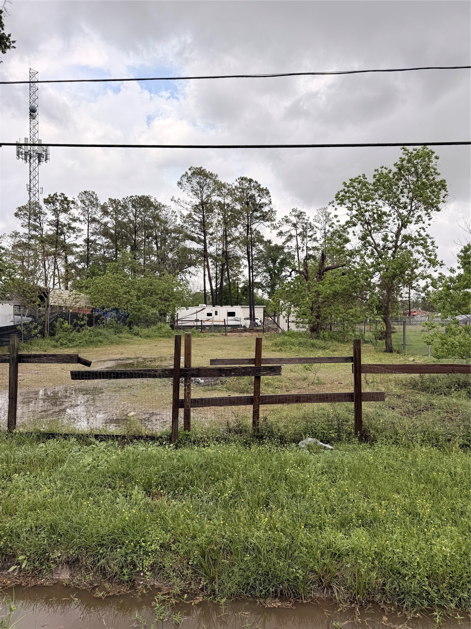 0 Heatherside Street Houston, TX 77016 - Photo 2 of 7 a view of a bench in the middle of a yard