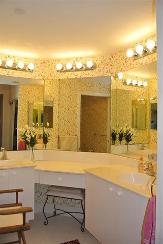 a view of a swimming pool and an outdoor seating