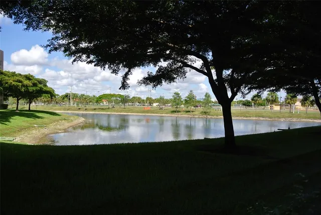 a view of a lake with a big yard