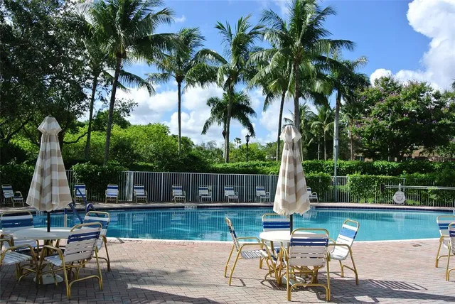 a view of house with outdoor seating space