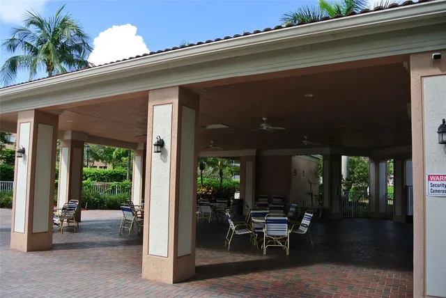 a view of a porch with seating space