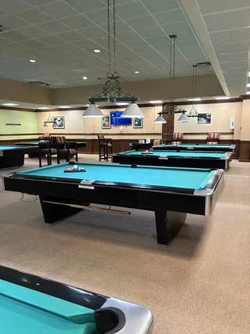 a room with lots of furniture and clutter