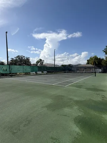 a view of a golf course with a lake