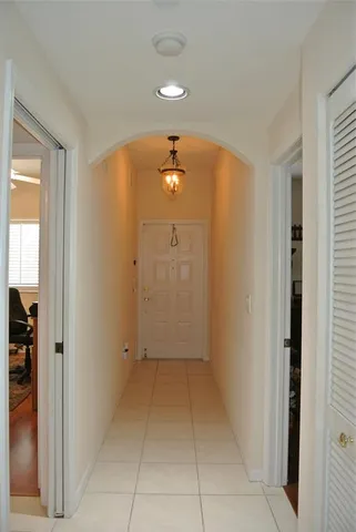 an entryway to room with a bathroom