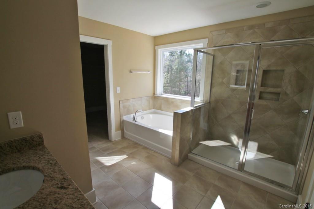 2207 Bluebell Way, Unit 14 Fort Mill, SC 29708 - Photo 11 of 20 a bathroom with a tub and shower