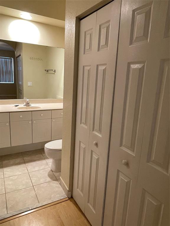 3389 Merrick Court Pompano Beach, FL 33063 - Photo 11 of 29 a bathroom with a sink a toilet and a shower