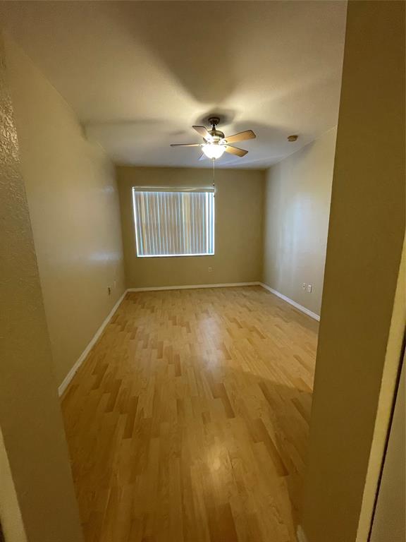 3389 Merrick Court Pompano Beach, FL 33063 - Photo 20 of 29 an empty room with windows