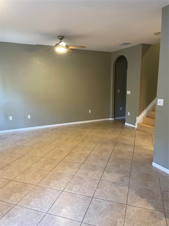 3389 Merrick Court Pompano Beach, FL 33063 - Photo 5 of 29 a view of an empty room with windows