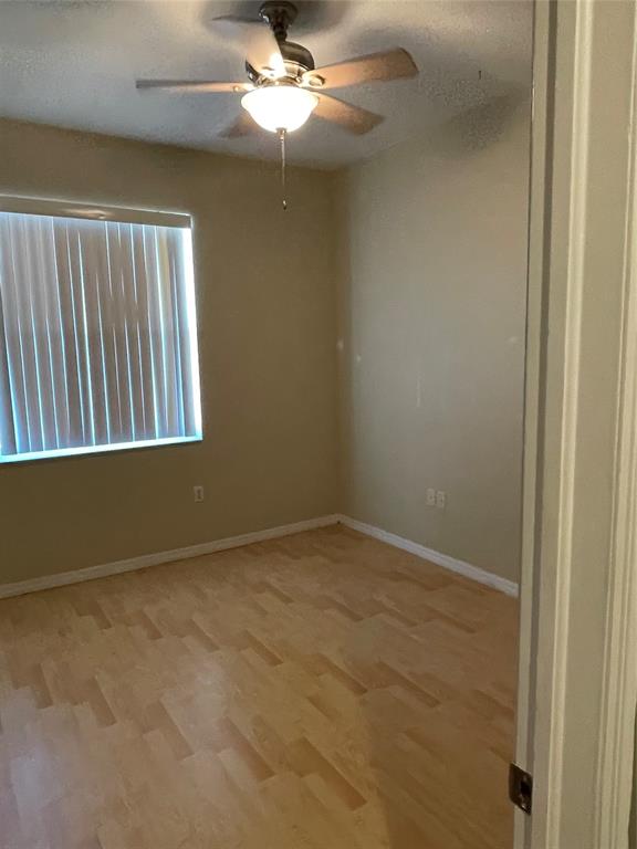 3389 Merrick Court Pompano Beach, FL 33063 - Photo 10 of 29 an empty room with a window