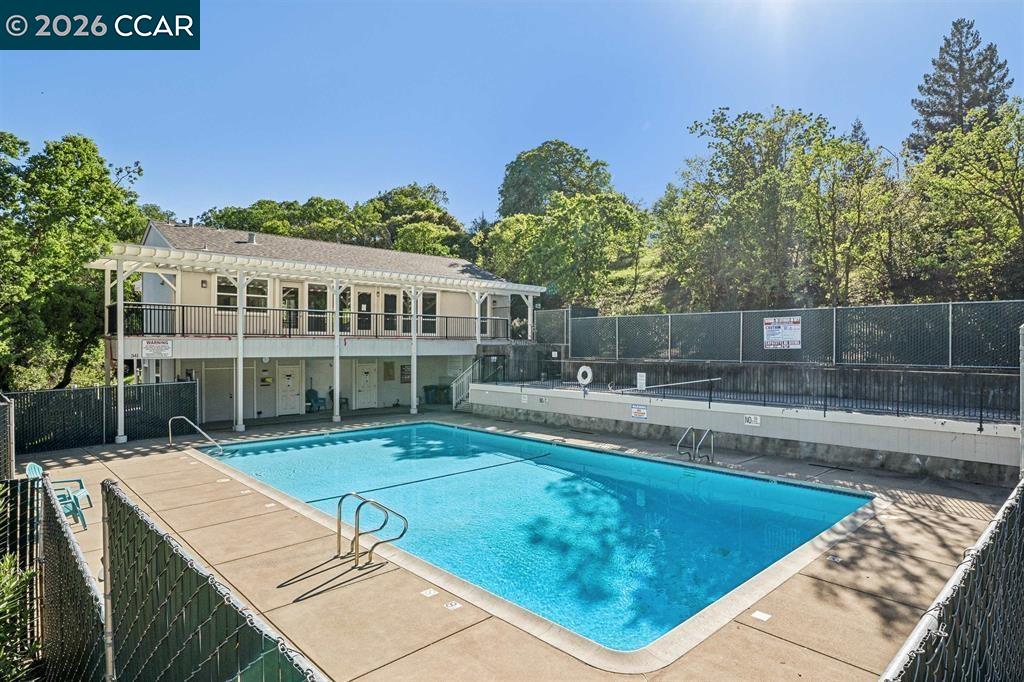438 Ridgeview Drive Pleasant Hill, CA 94523 - Photo 9 of 12 a view of a house with swimming pool