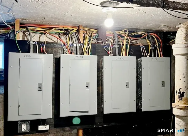 a view of walk in closet with clothes