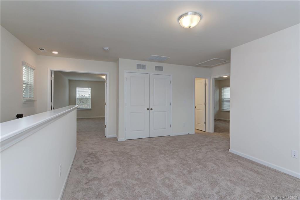 2014 Blue Pond Road Matthews, NC 28104 - Photo 19 of 32 a view of an empty room with a fireplace