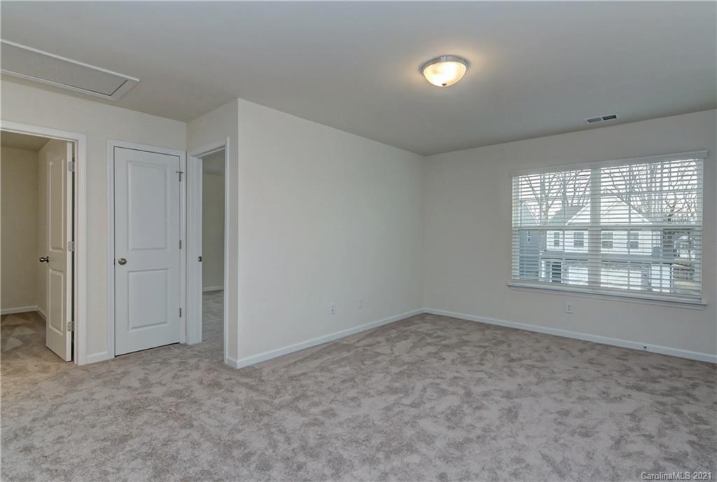 2014 Blue Pond Road Matthews, NC 28104 - Photo 20 of 32 a view of an empty room with a window