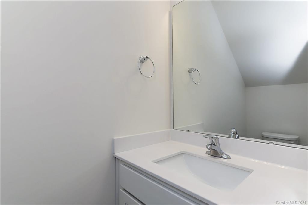 2014 Blue Pond Road Matthews, NC 28104 - Photo 28 of 32 a bathroom with a sink and a mirror