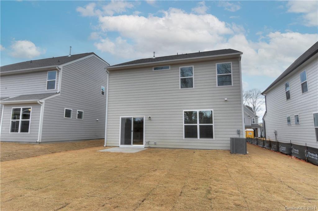 2014 Blue Pond Road Matthews, NC 28104 - Photo 31 of 32 a house view with a backyard space