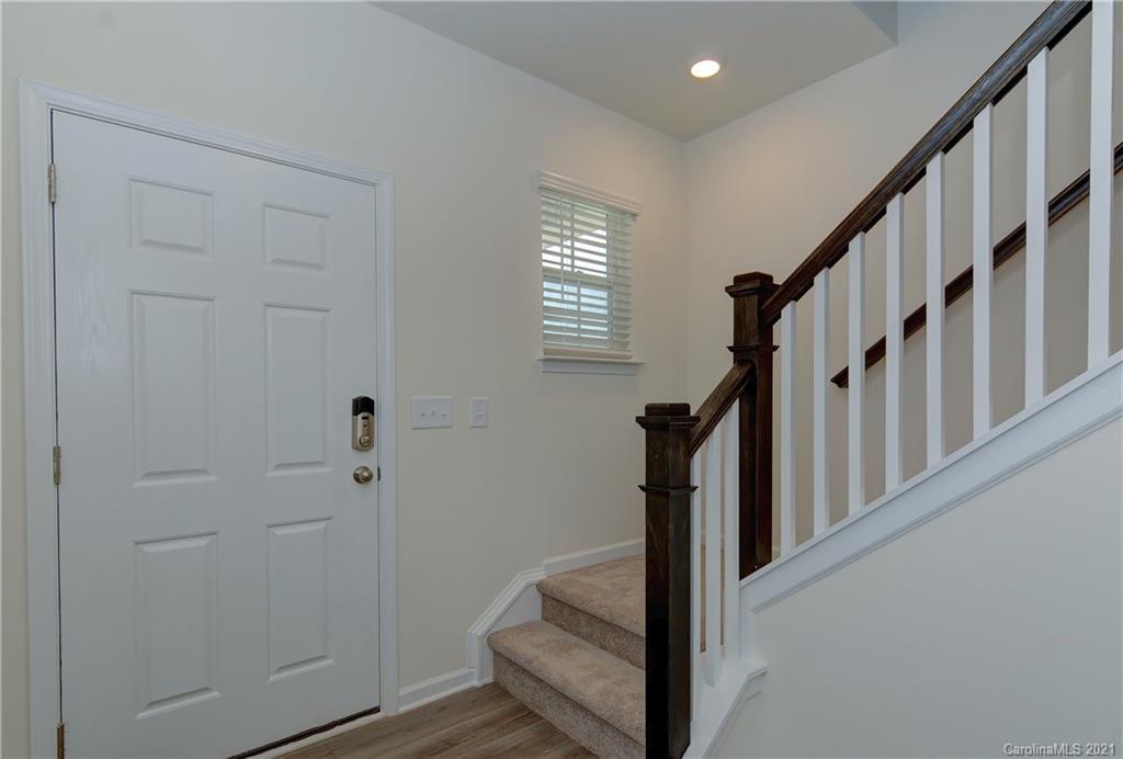 2014 Blue Pond Road Matthews, NC 28104 - Photo 5 of 32 a view of entryway with wooden floor and stairs