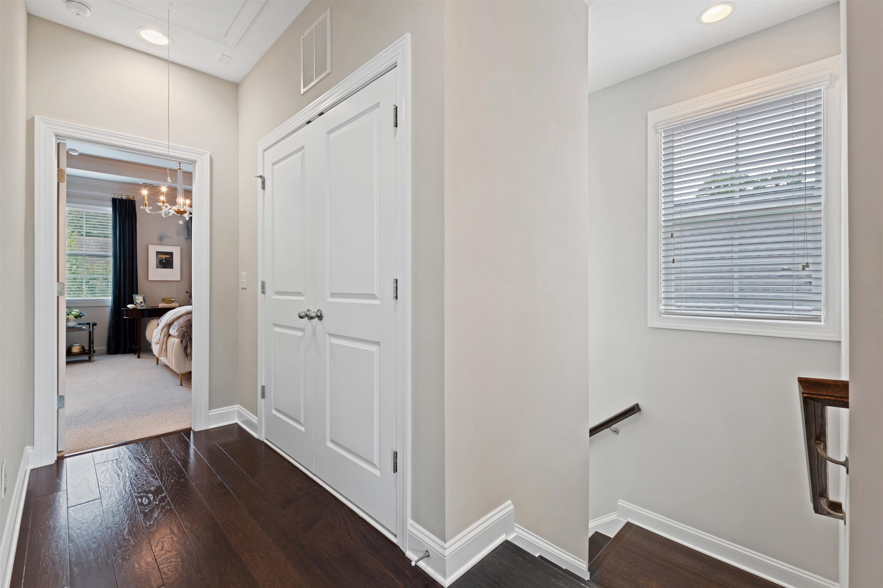 220 Penley Circle Raleigh, NC 27609 - Photo 28 of 56 a view of a bedroom with a hardwood floor